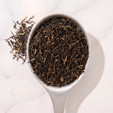 Castleton Darjeeling Black Tea in a measuring scoop