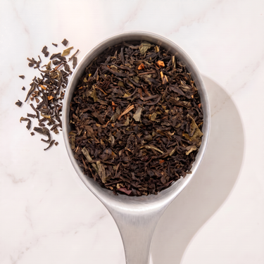 Darjeeling Pan Fired Black Tea in a measuring scoop