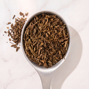 Hojicha Green Tea in a measuring scoop