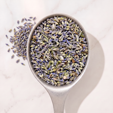 Lavender Flower Herbal Tea in a measuring scoop