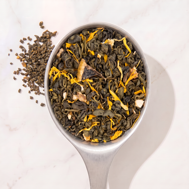 Lemon Green Tea in a measuring scoop