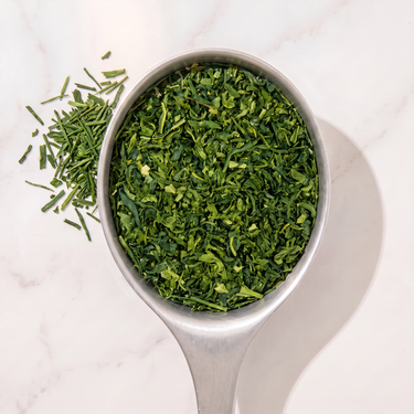 Sencha Decaf Green Tea in a measuring scoop