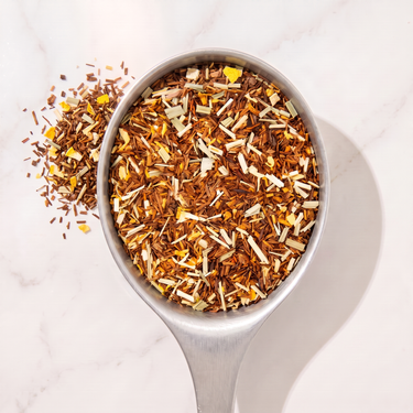 Sunshine Lemon Rooibos Tea in a measuring scoop