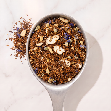 Almonds Rooibos Tea in a measuring scoop