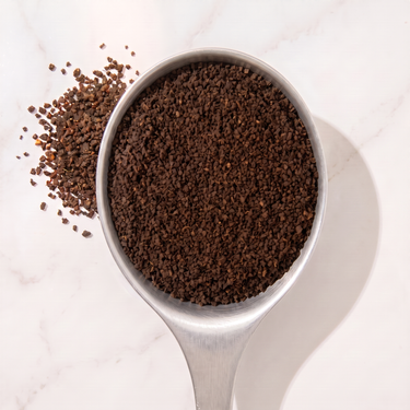 Assam Tarajulie Black Tea in a measuring scoop