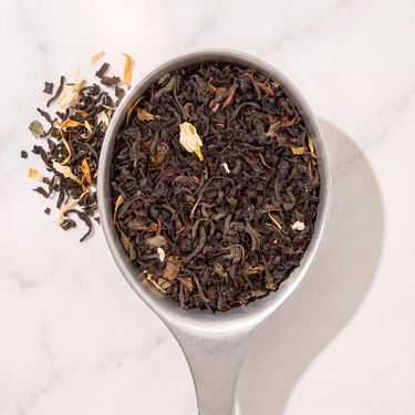 Lily des Collines Orange Blossom Tea in a measuring scoop
