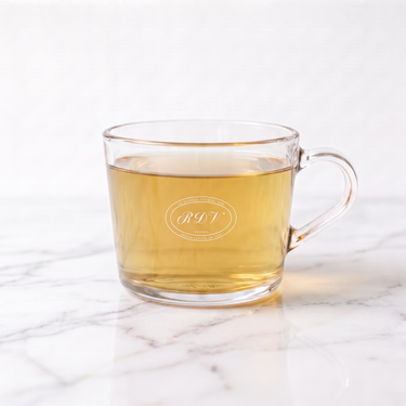 Egyptian Chamomile Herbal Tea side view in a branded RDV glass cup