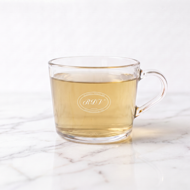 Pai Mu Tan White Tea side view in a branded RDV glass cup