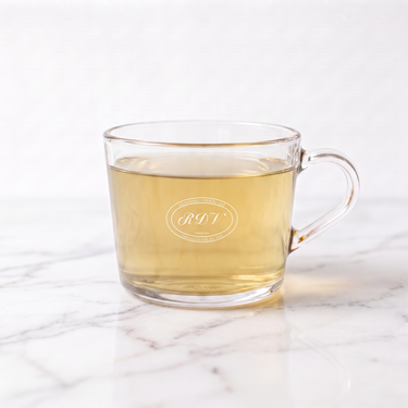 100 Monkeys White Tea side view in a branded RDV glass cup