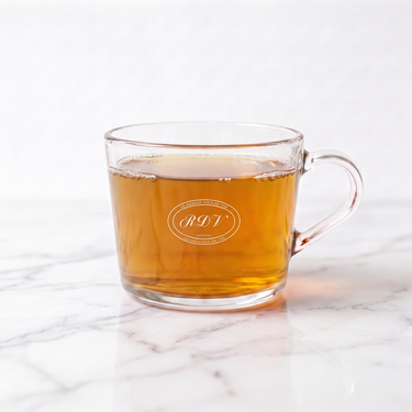 Castleton Darjeeling Black Tea side view in a branded RDV glass cup